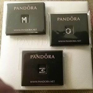 Set of Pandora petite "MOM" letters